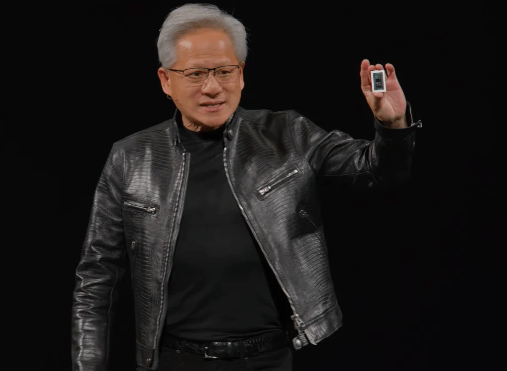 Nvidia Jensen Huang holds up RTX Spark chip